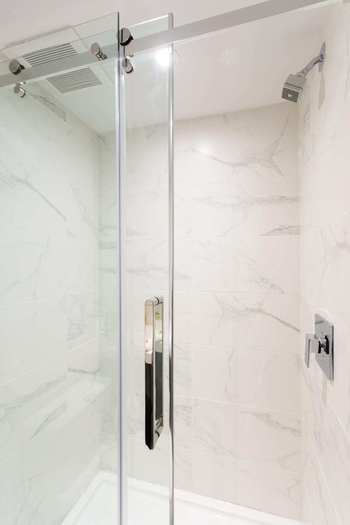 Serene And Styled Little Italy Full Bath By Den Montreal