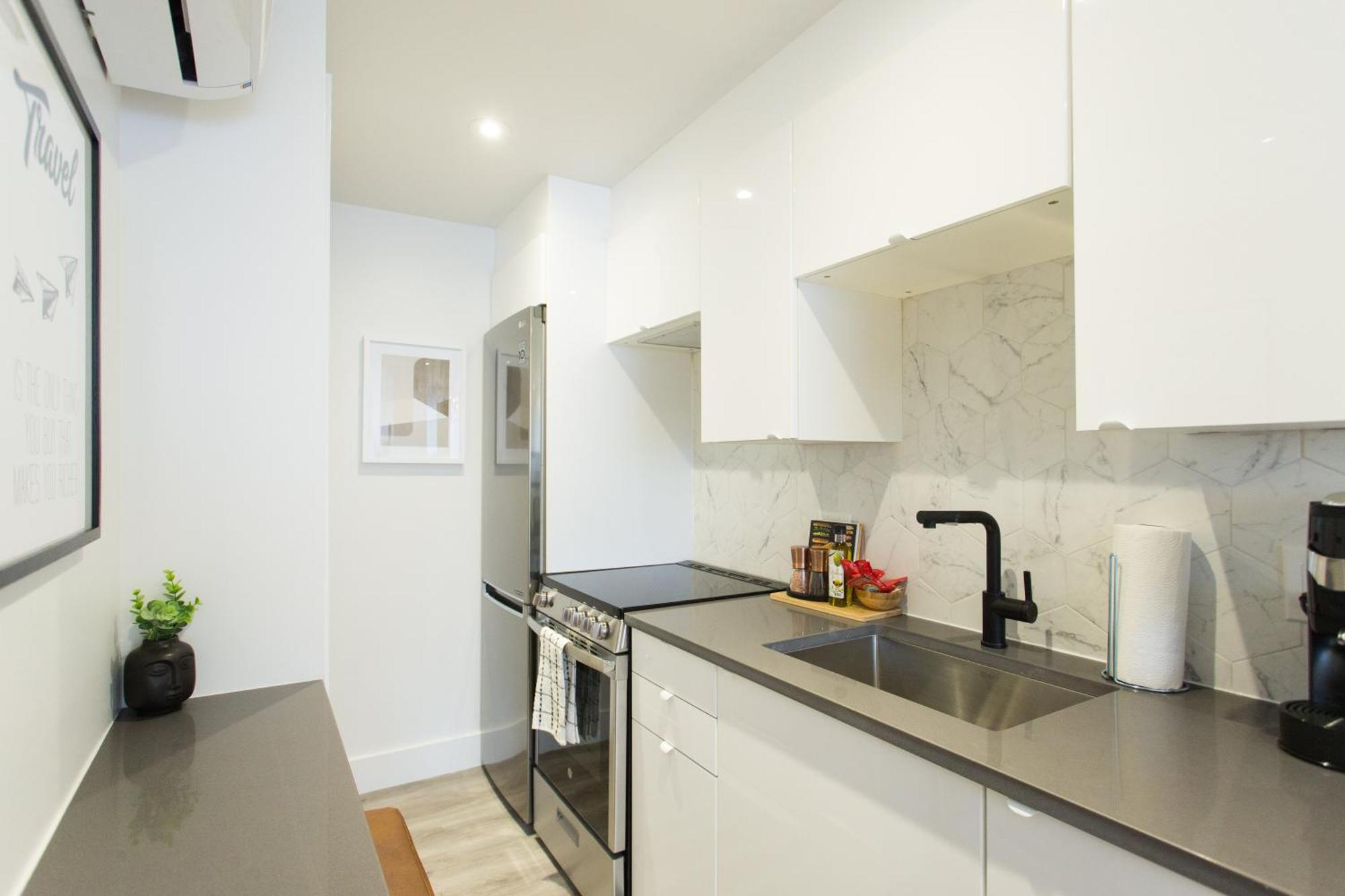 Serene And Styled Little Italy Full Bath By Den Apartment *