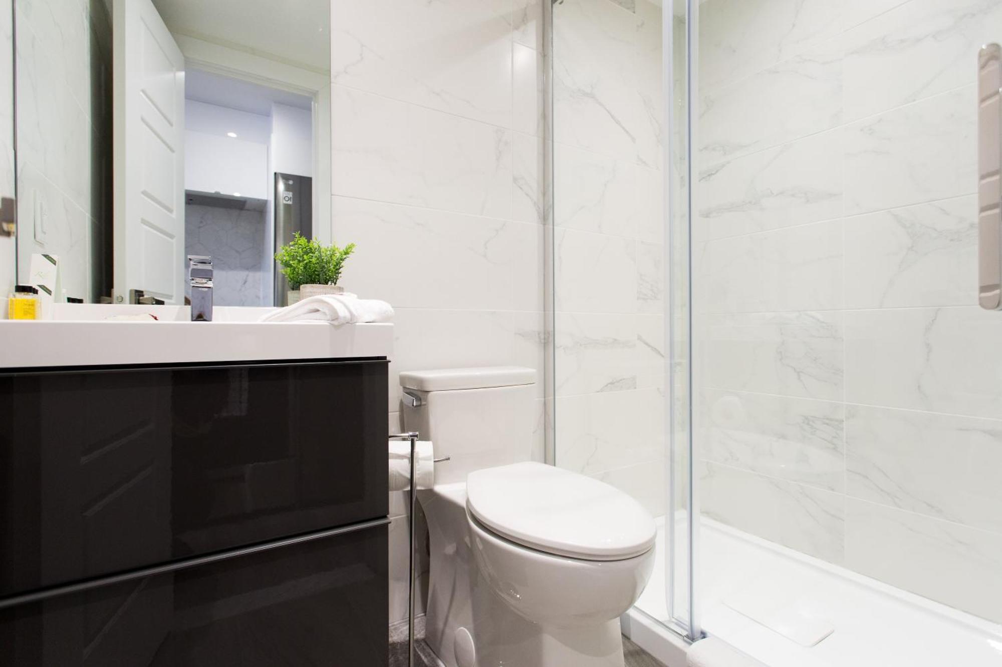 Serene And Styled Little Italy Full Bath By Den Montreal