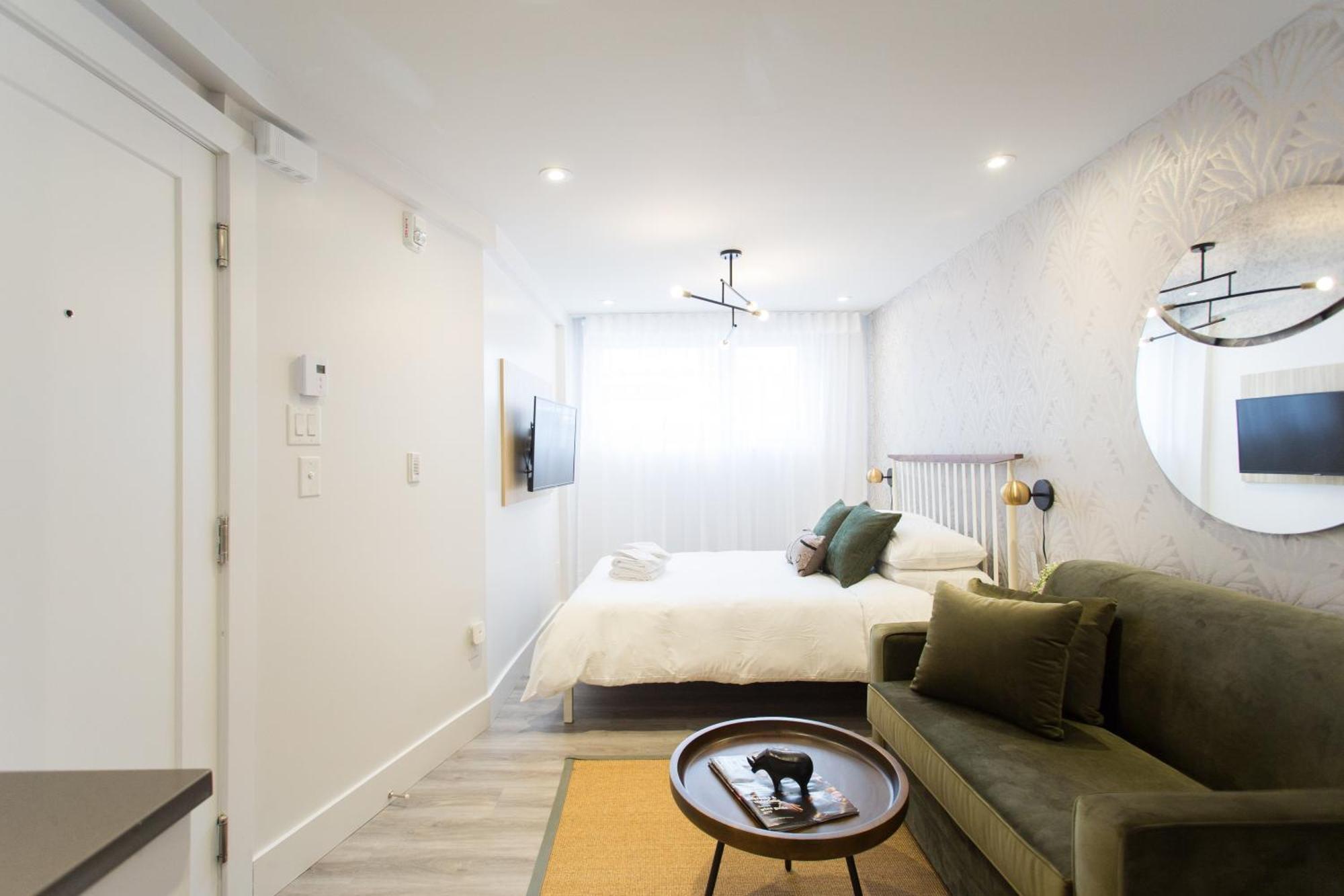 Serene And Styled Little Italy Full Bath By Den Apartment Montreal